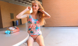 Slender Hannah Hays flashes her cute blue panties in the park and shoves a sword-like dildo indoors