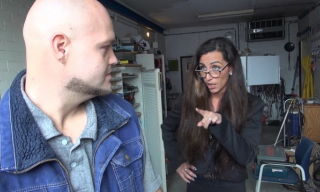 Strict lady-boss opens long legs in patterned mesh stockings to spank and sodomize her slack workers