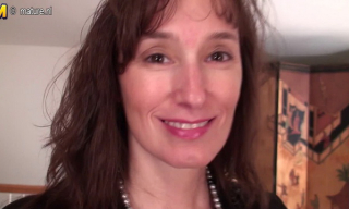 Naughty housewife reveals her fancy seamed fishnets and silky turquoise lingerie stripping on cam