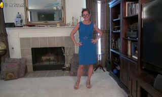 Respectable US mature Flower strips to her creamy teddy revealing big boobs before toying her bush