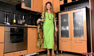 Psychedelic housewife Helen Volga strips her bright undies and gown to frig her bush in tan fishnets