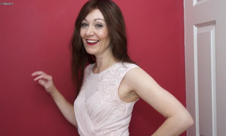 Dressy British old lady Kitty Creamer shows off her best lingerie and stockings