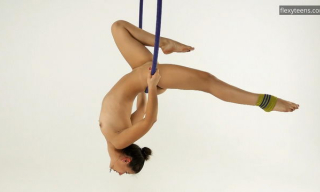 Aerial gymnast Kim Nadara aka Dea Ishtar performs exercises naked